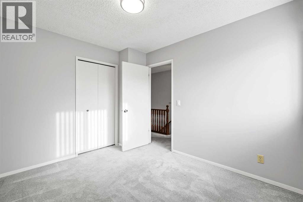 115 Brookgreen Drive Sw, Calgary, Alberta  T2W 2W4 - Photo 10 - A2268291