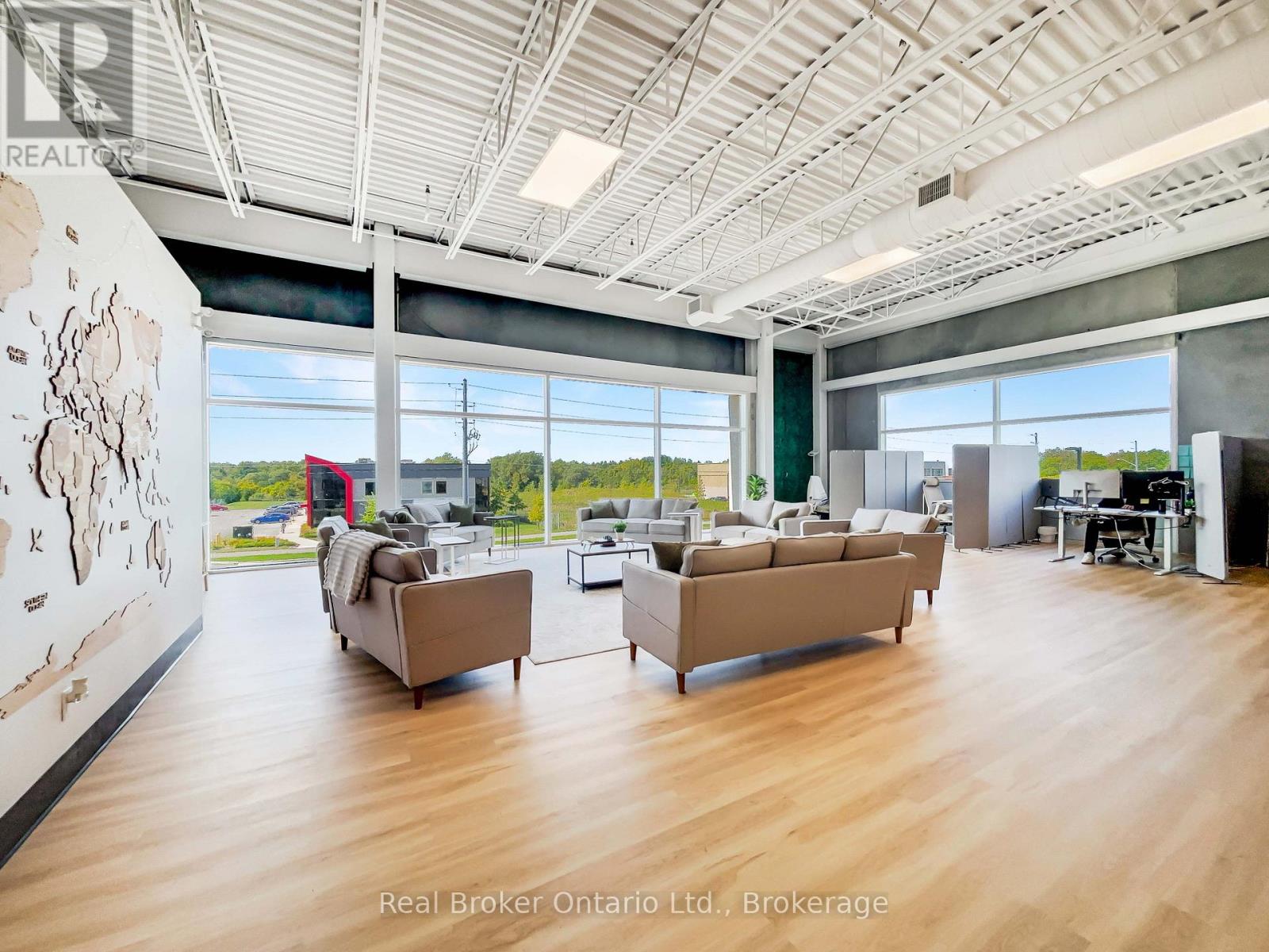 205b - 195 Hanlon Creek Boulevard, Guelph, Ontario N1C 0A1 - Photo 1 - X12523842