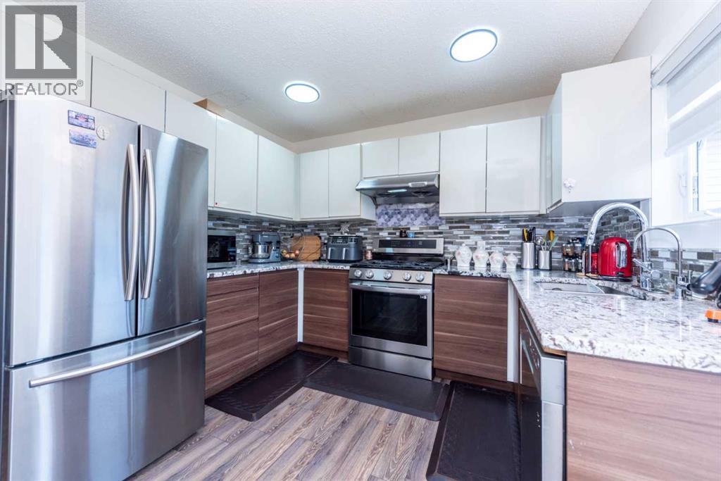 39 Tararidge Drive Ne, Calgary, Alberta  T3J 2R4 - Photo 4 - A2250054