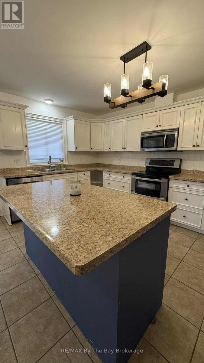 41 Melrose Avenue, Wasaga Beach, Ontario  L9Z 2S8 - Photo 13 - S12524276