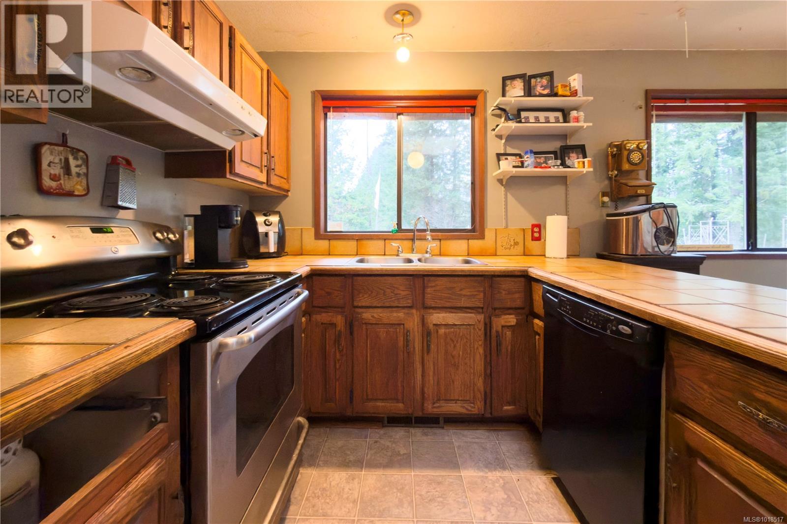 9571 Gleadle Rd, Black Creek, British Columbia  V9J 1G1 - Photo 9 - 1018517