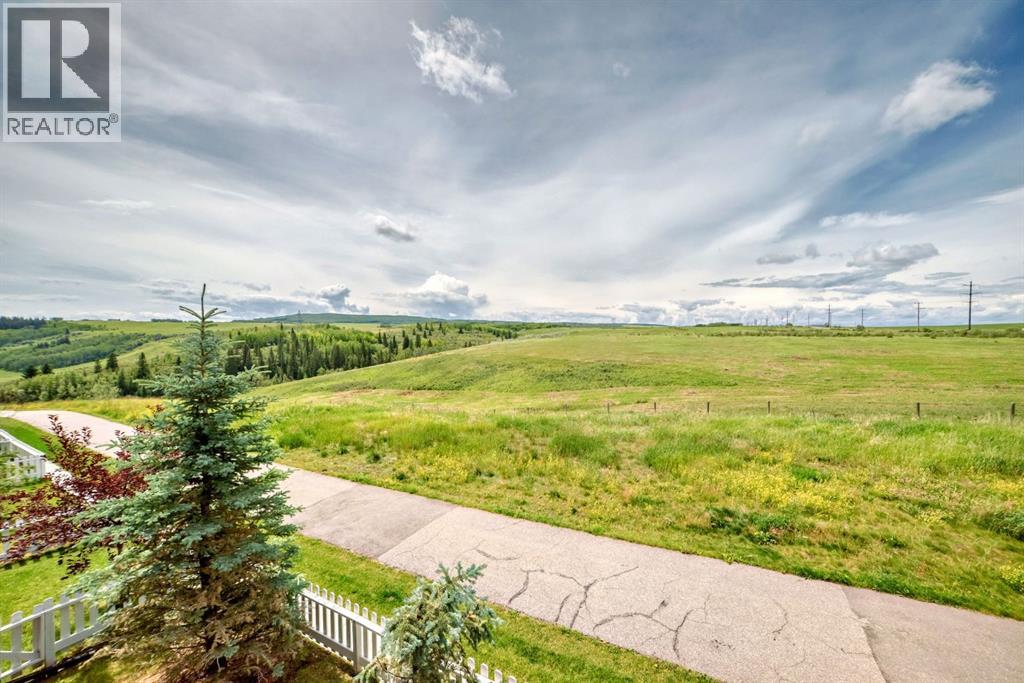 1703 Jumping Pound Common, Cochrane, Alberta  T4C 2L1 - Photo 7 - A2240077