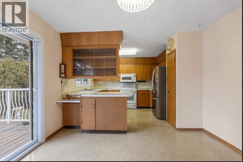 5339 Brisebois Drive Nw, Calgary, Alberta  T2L 2G9 - Photo 11 - A2268140