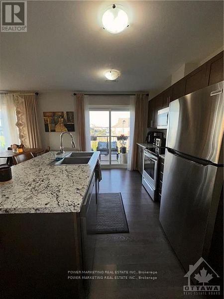 704c - 704 Amberwing Private, Ottawa, Ontario K4A 5H5 - Photo 7 - X12524394