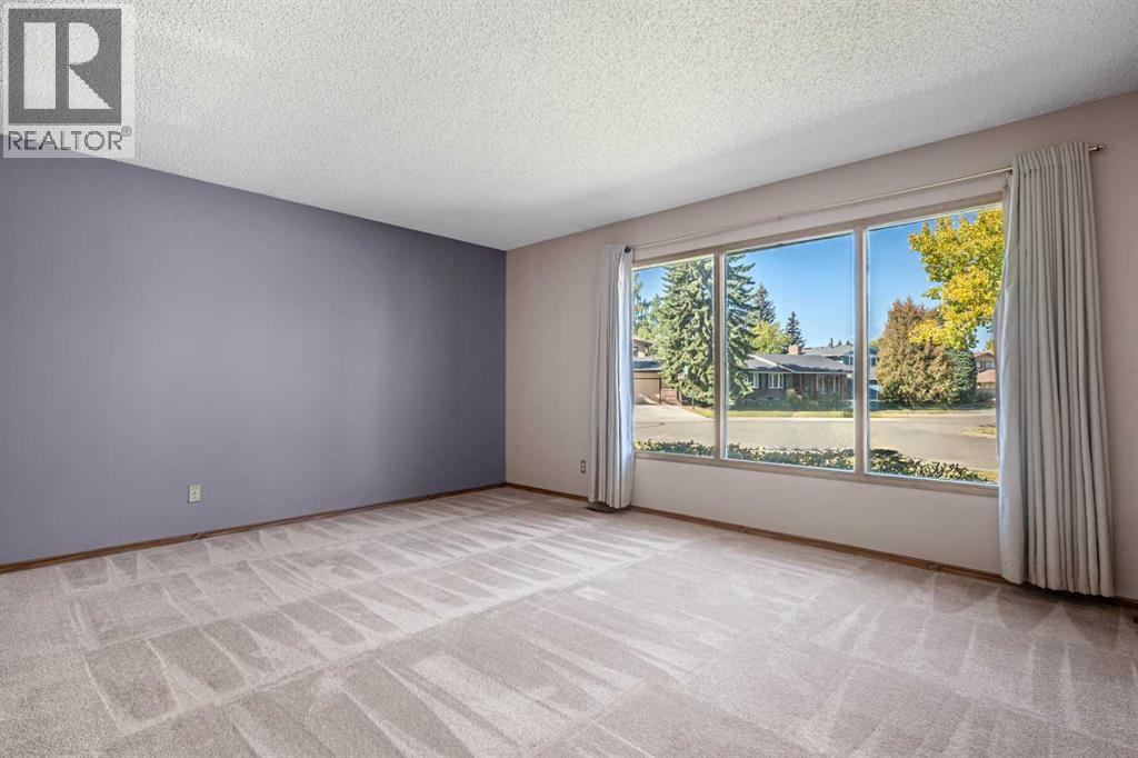 344 Parkland Way Se, Calgary, Alberta  T2J 4L2 - Photo 4 - A2258580