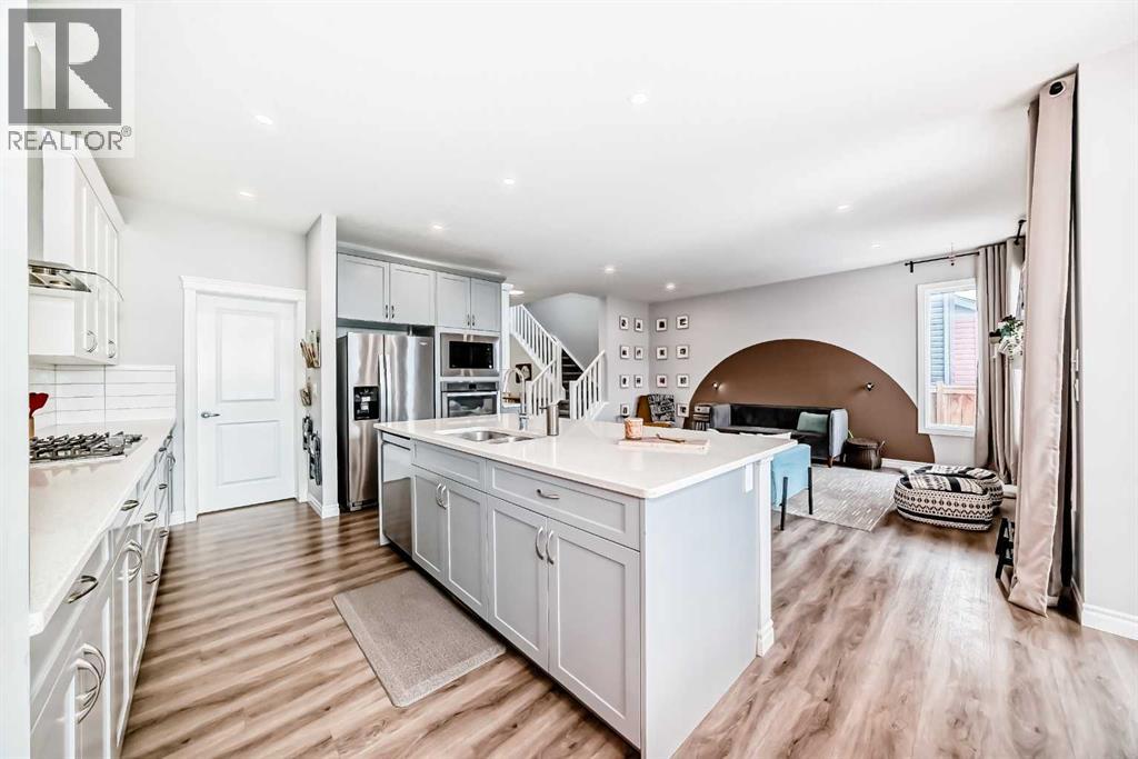 564 Belmont Heath Sw, Calgary, Alberta  T2X 4H4 - Photo 8 - A2264093