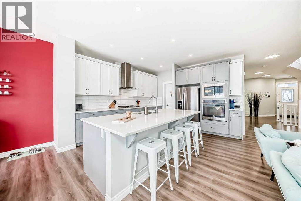 564 Belmont Heath Sw, Calgary, Alberta  T2X 4H4 - Photo 7 - A2264093