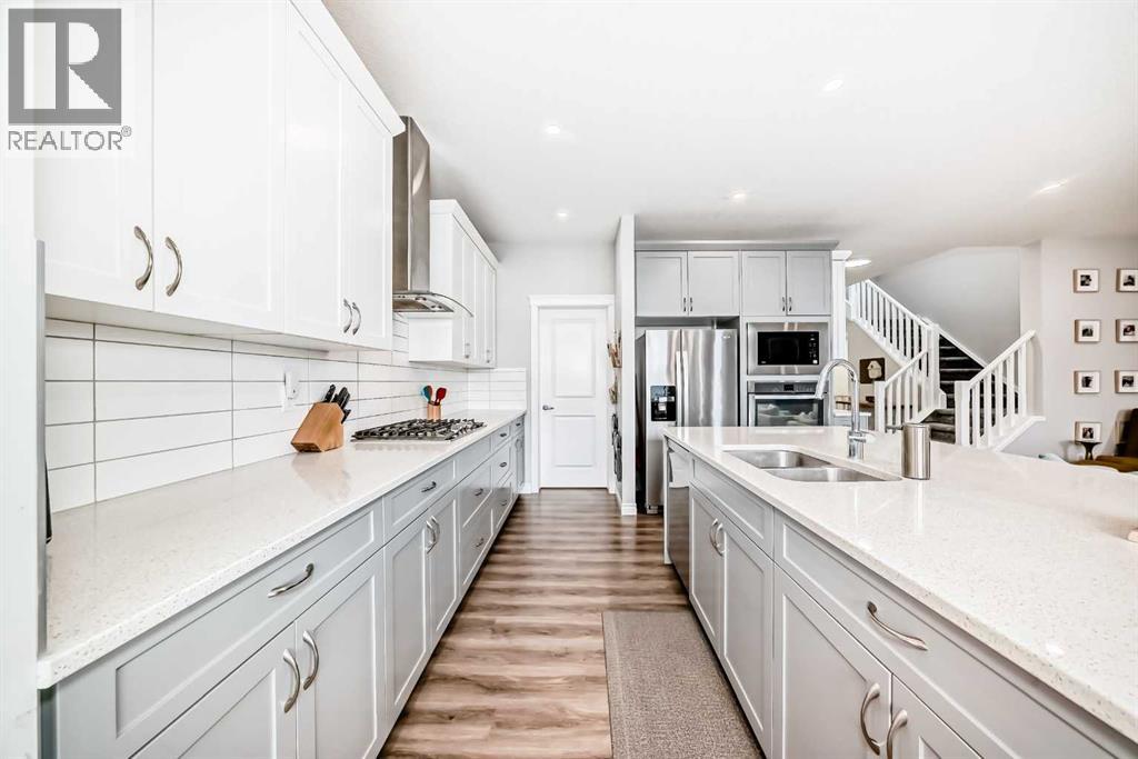 564 Belmont Heath Sw, Calgary, Alberta  T2X 4H4 - Photo 9 - A2264093