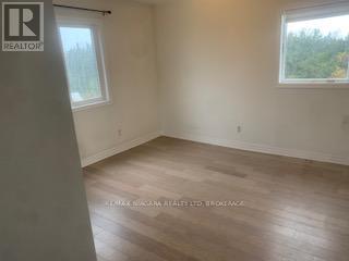 Upper Unit #1 - 33266 Pettit Road, Wainfleet, Ontario L0S 1V0 - Photo 2 - X12524658