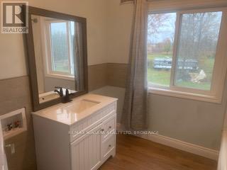 Upper Unit #1 - 33266 Pettit Road, Wainfleet, Ontario L0S 1V0 - Photo 4 - X12524658