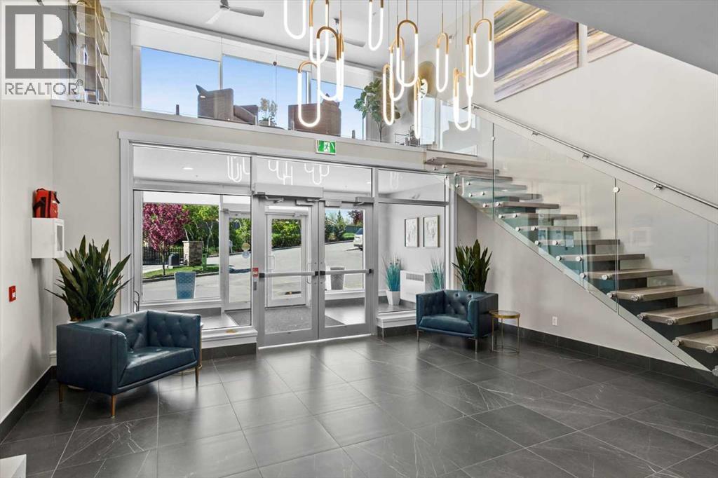 313, 15 Cougar Ridge Landing Sw, Calgary, Alberta  T3H 6C3 - Photo 6 - A2223439