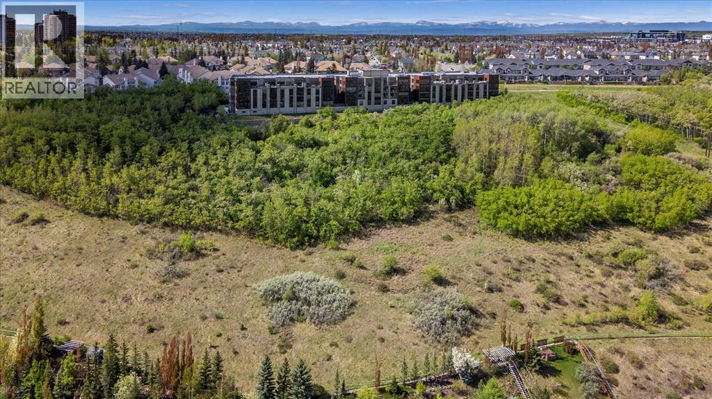 313, 15 Cougar Ridge Landing Sw, Calgary, Alberta  T3H 6C3 - Photo 2 - A2223439