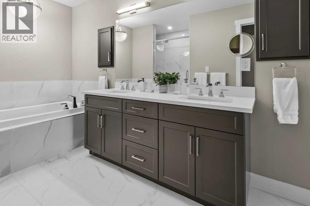 313, 15 Cougar Ridge Landing Sw, Calgary, Alberta  T3H 6C3 - Photo 24 - A2223439