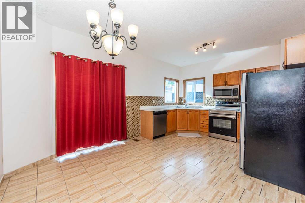 14993 5 Street Sw, Calgary, Alberta  T2Y 3E2 - Photo 16 - A2260094