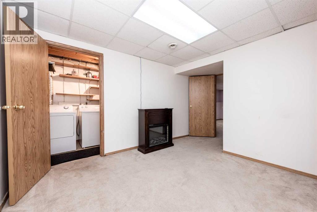 14993 5 Street Sw, Calgary, Alberta  T2Y 3E2 - Photo 34 - A2260094