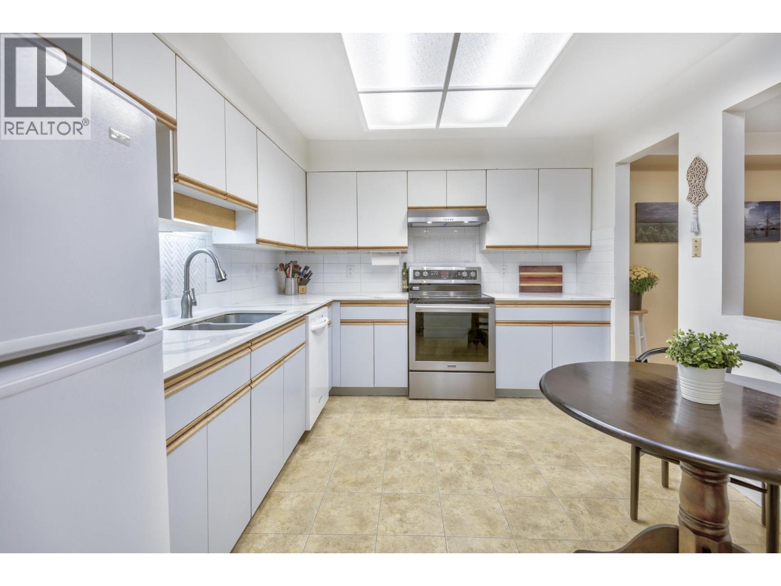 102 501 Cochrane Avenue, Coquitlam, British Columbia  V3J 7W5 - Photo 5 - R3058031