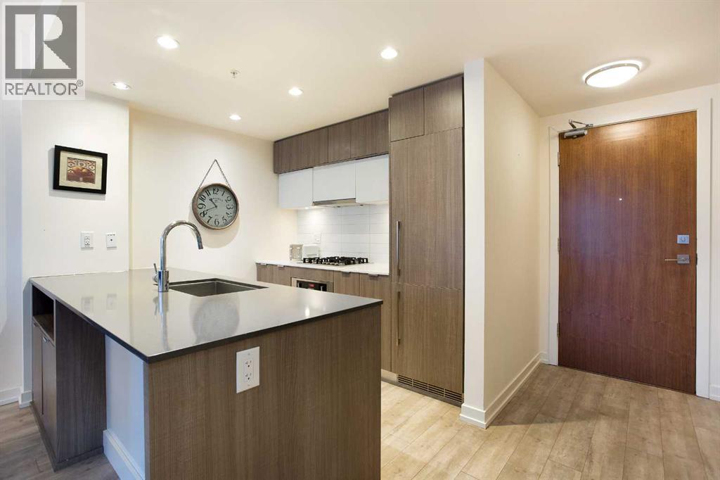 205, 51 Waterfront Mews Sw, Calgary, Alberta  T2P 0X3 - Photo 4 - A2263772