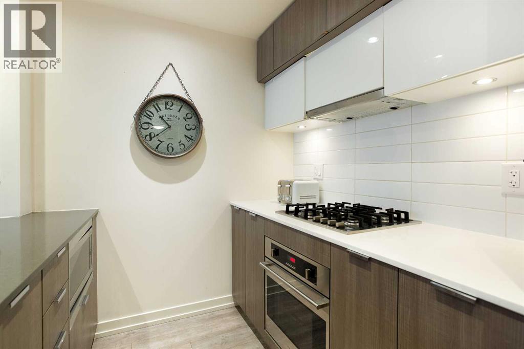 205, 51 Waterfront Mews Sw, Calgary, Alberta  T2P 0X3 - Photo 5 - A2263772