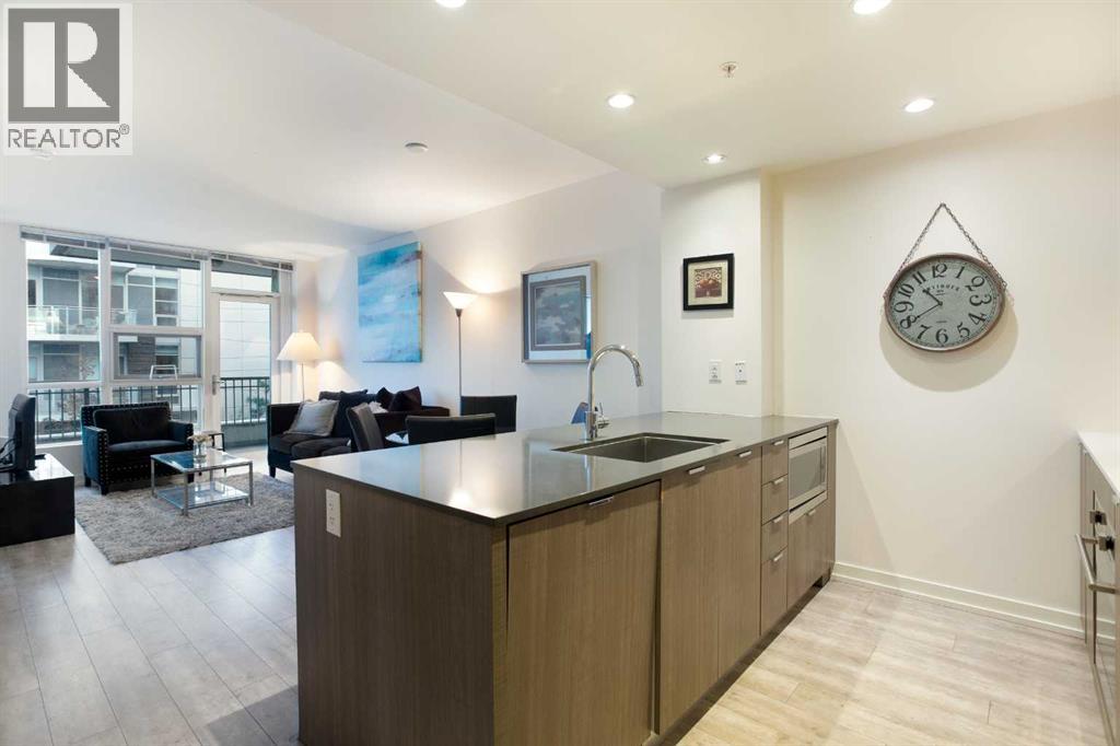 205, 51 Waterfront Mews Sw, Calgary, Alberta  T2P 0X3 - Photo 3 - A2263772