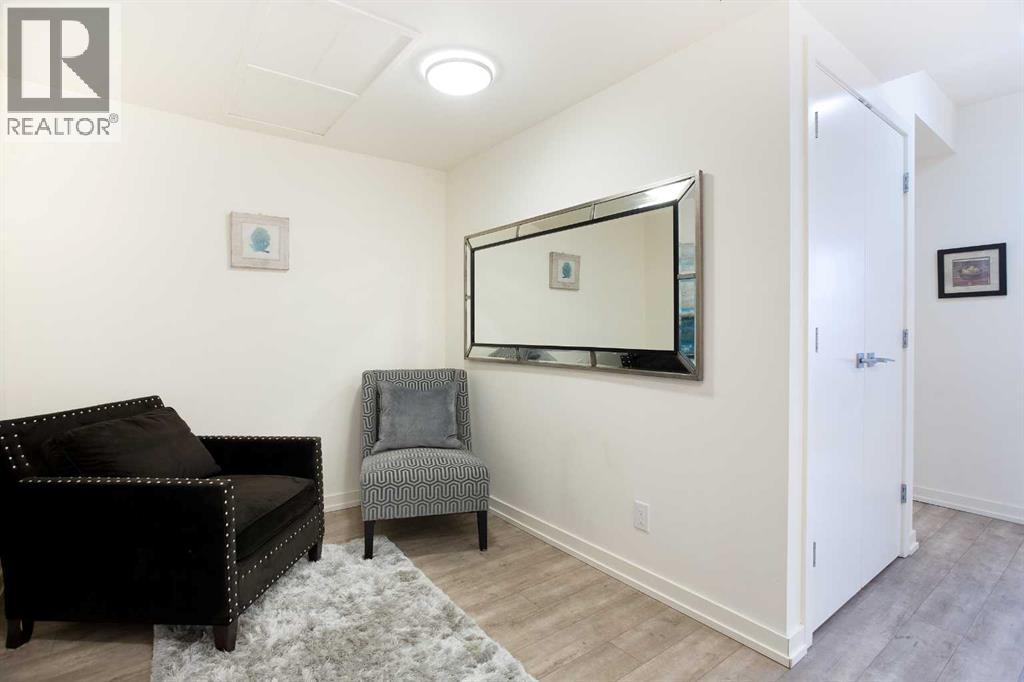 205, 51 Waterfront Mews Sw, Calgary, Alberta  T2P 0X3 - Photo 18 - A2263772