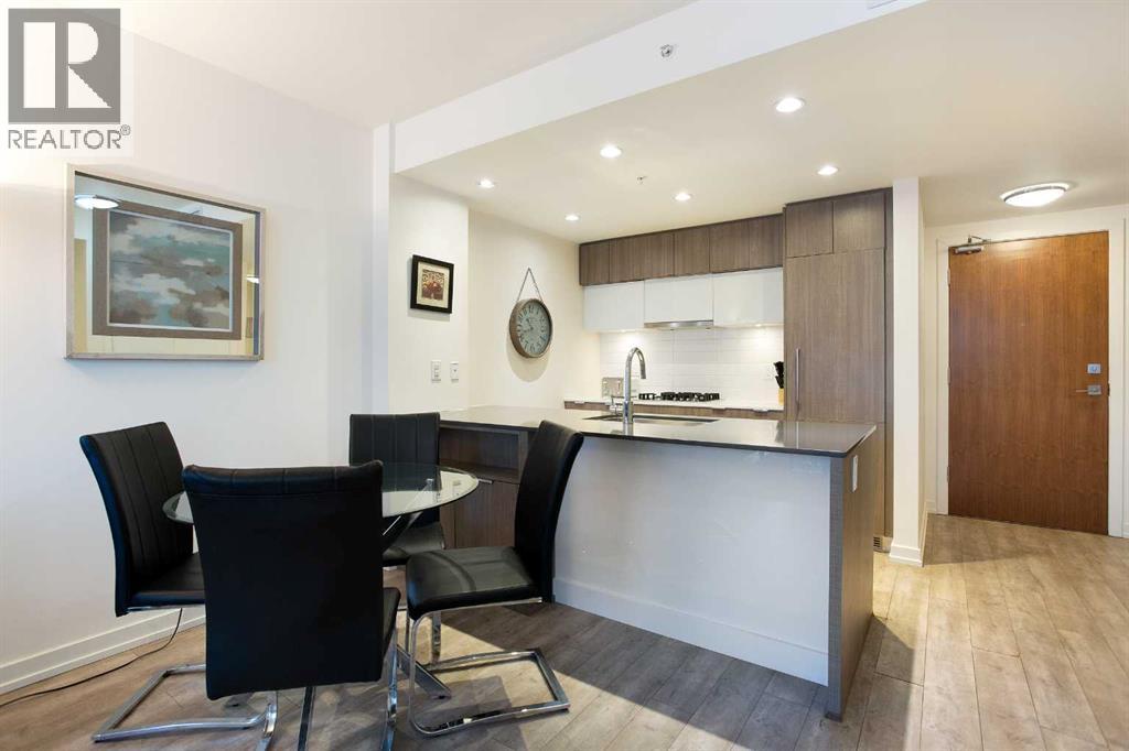 205, 51 Waterfront Mews Sw, Calgary, Alberta  T2P 0X3 - Photo 7 - A2263772