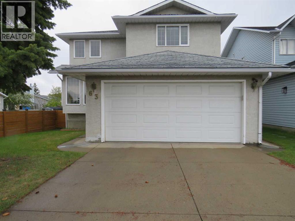 63 La Valencia Gardens Ne, Calgary, Alberta  T1Y 6P5 - Photo 2 - A2265616