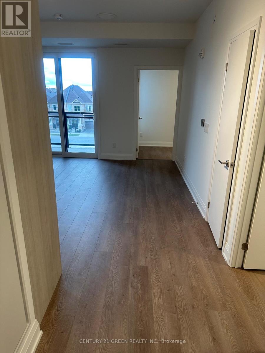 307 - 3250 Carding Mill Trail, Oakville, Ontario L6M 1L3 - Photo 2 - W12524982