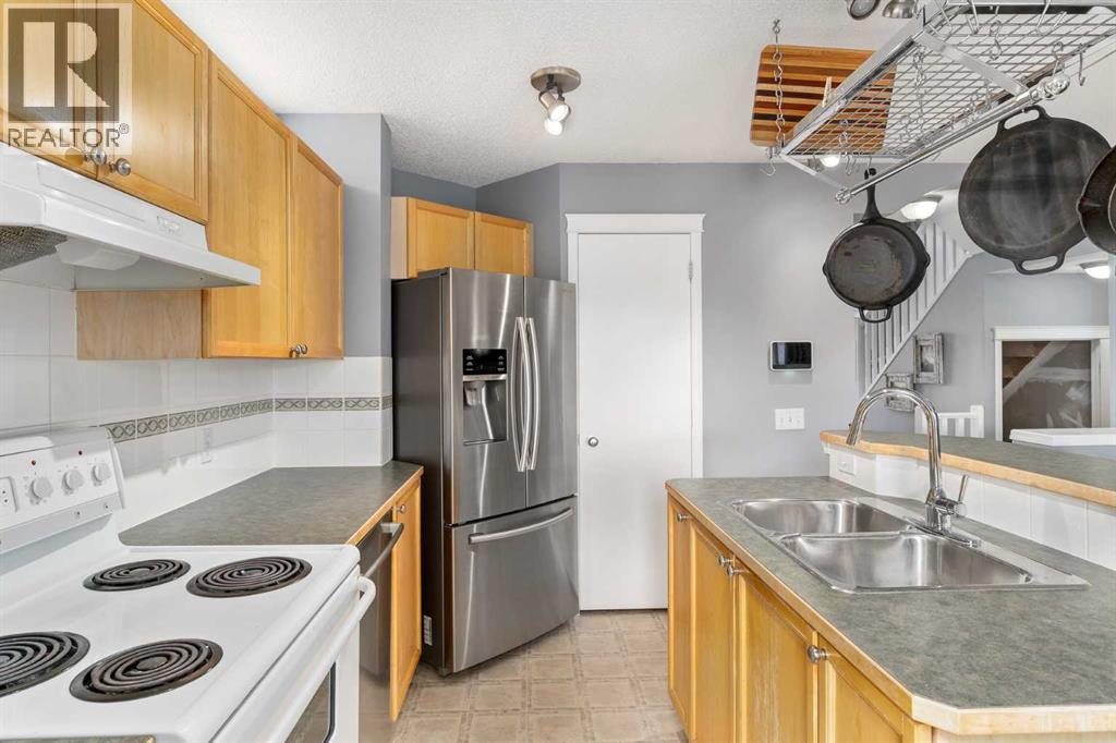 14 Tuscany Springs Rise Nw, Calgary, Alberta  T3L 2S2 - Photo 9 - A2233060