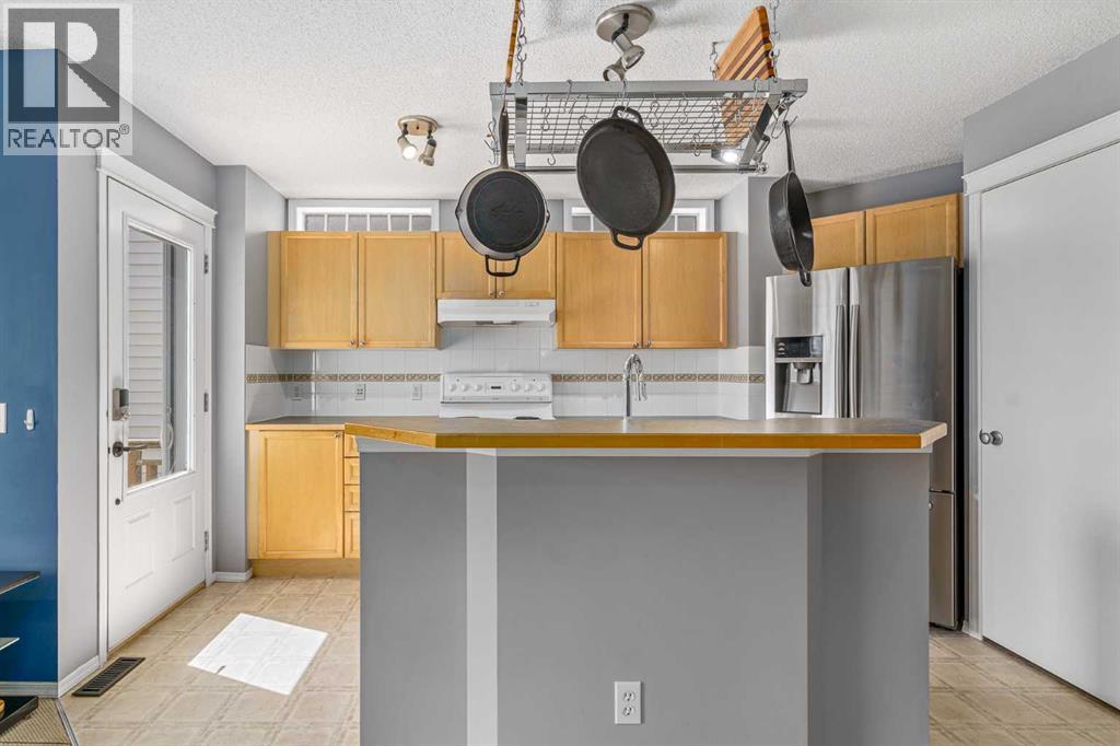 14 Tuscany Springs Rise Nw, Calgary, Alberta  T3L 2S2 - Photo 7 - A2233060