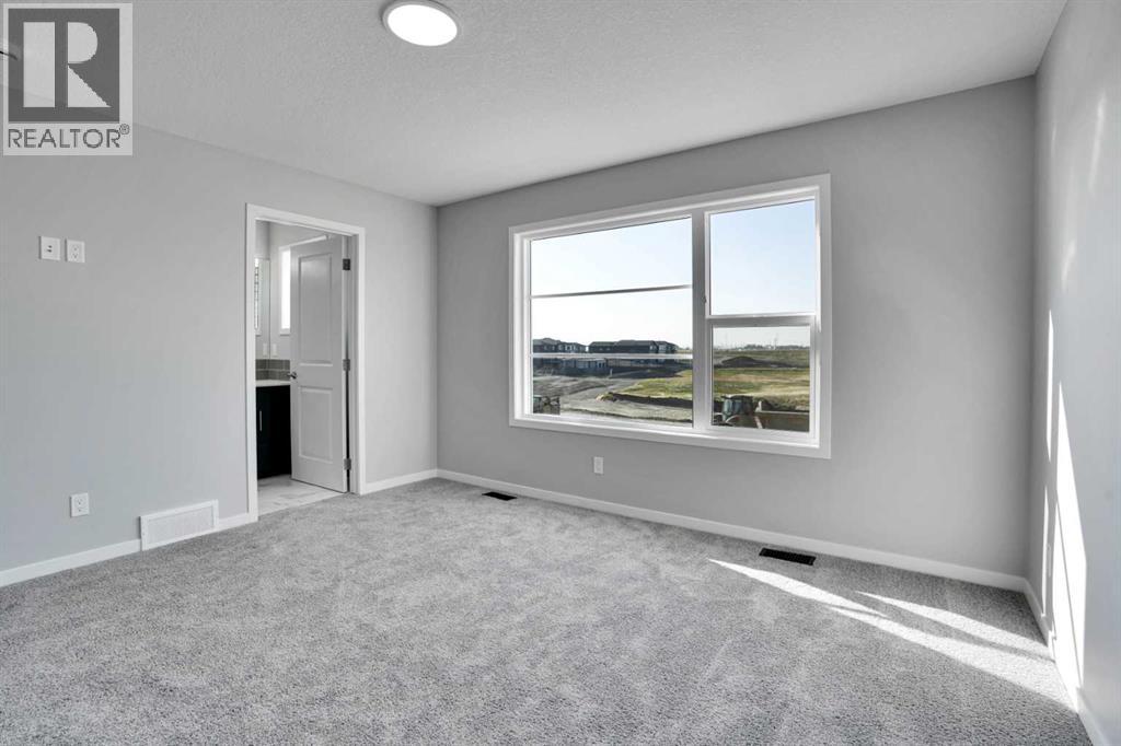 74 Corner Glen Grove Ne, Calgary, Alberta  T3N 2S9 - Photo 11 - A2258657