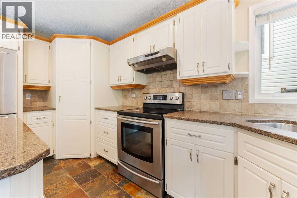 9 Valley Meadow Close Nw, Calgary, Alberta  T3B 5M1 - Photo 28 - A2250641