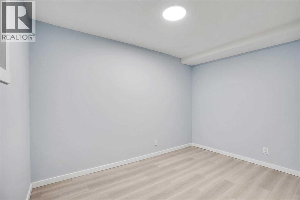 229 Luxstone Way Sw, Airdrie, Alberta  T4B 0H8 - Photo 4 - A2269642