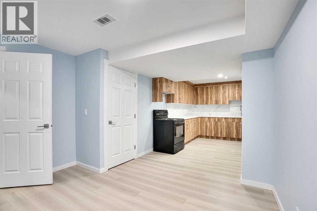 229 Luxstone Way Sw, Airdrie, Alberta  T4B 0H8 - Photo 7 - A2269642