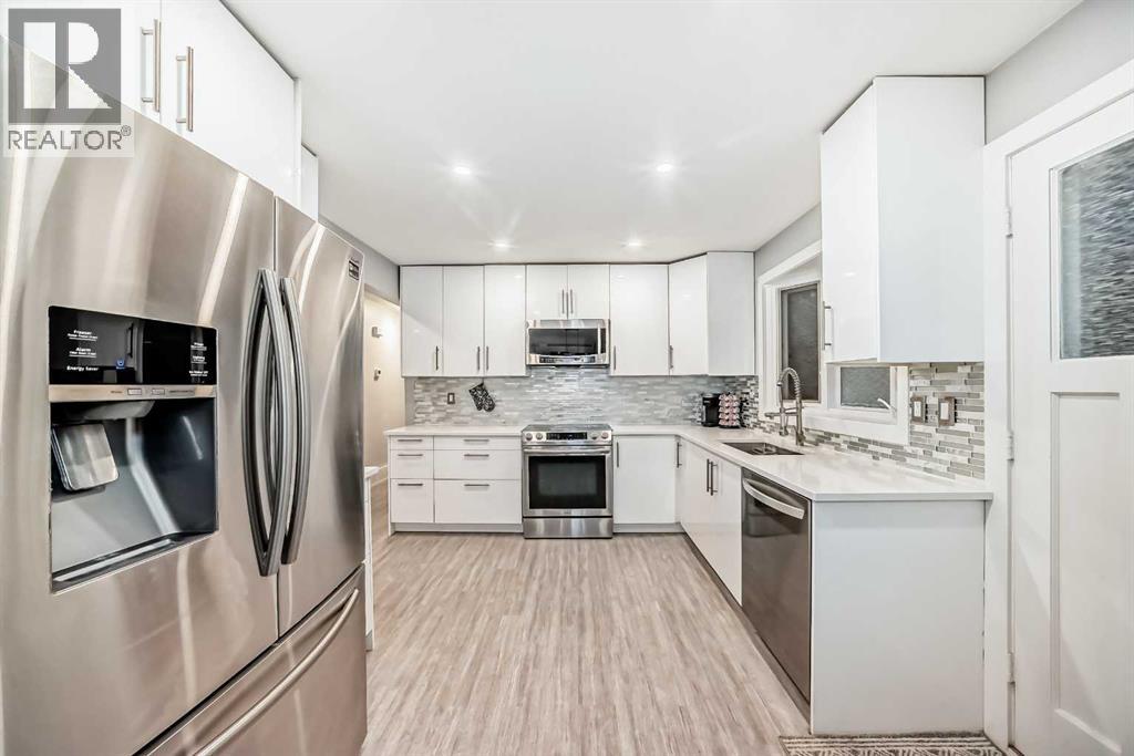 466 Huntley Way Ne, Calgary, Alberta  T2K 4Z8 - Photo 7 - A2269331