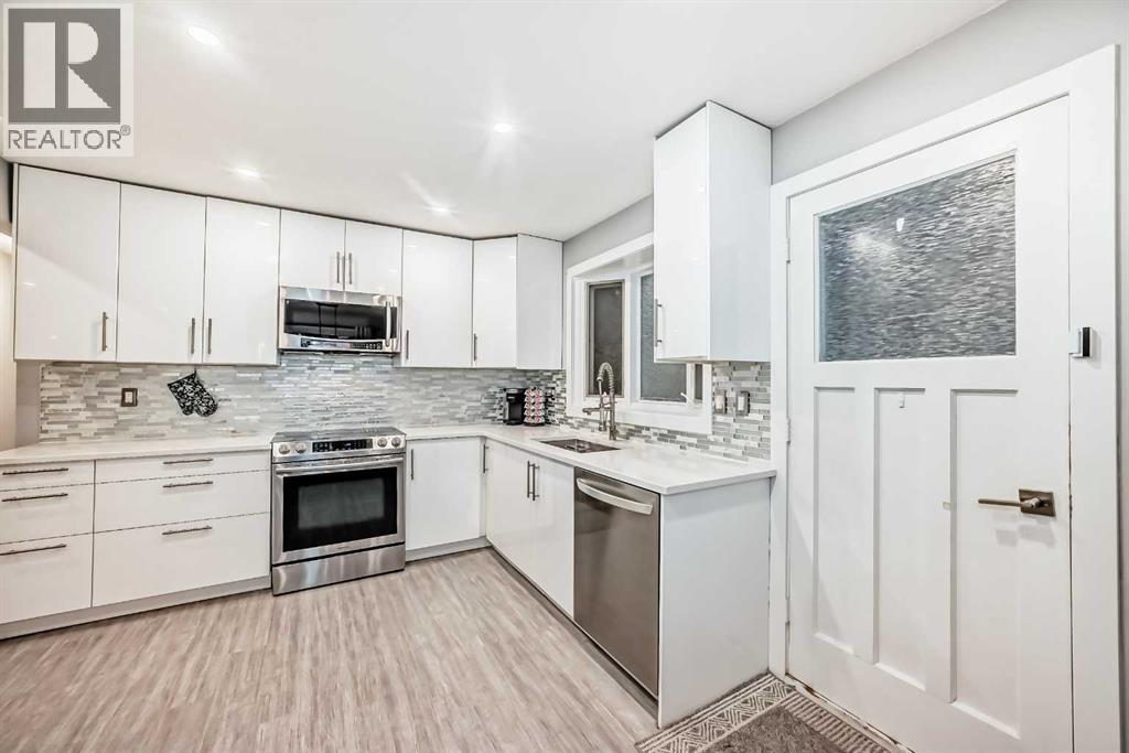 466 Huntley Way Ne, Calgary, Alberta  T2K 4Z8 - Photo 8 - A2269331