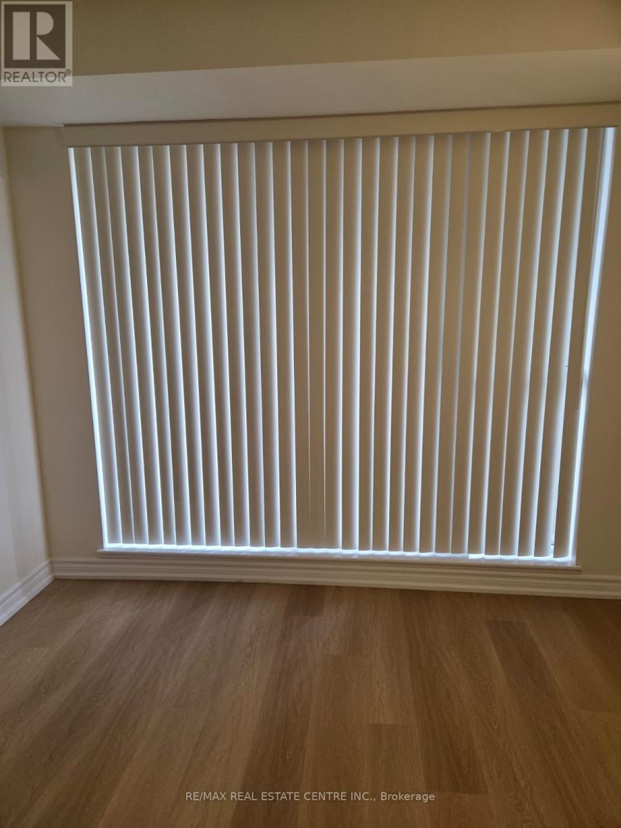 705 - 5 Michael Power Place, Toronto, Ontario  M9A 0A3 - Photo 4 - W12525606