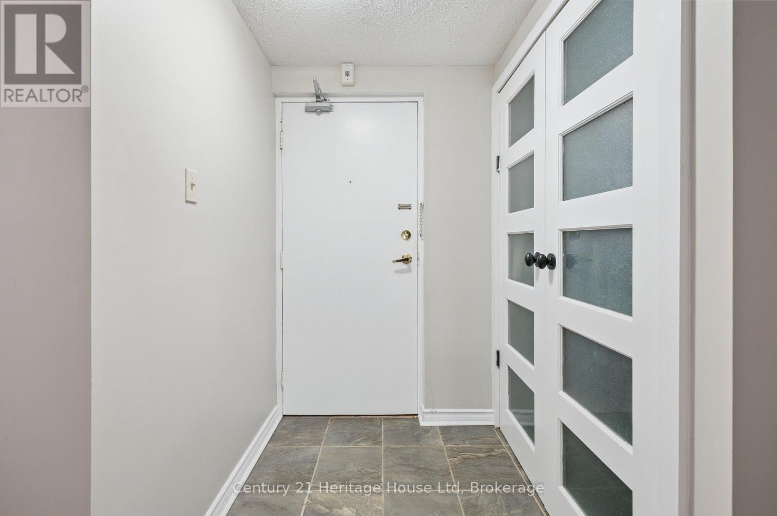 203 - 10 Ajax Street, Guelph, Ontario N1H 7N6 - Photo 2 - X12525804