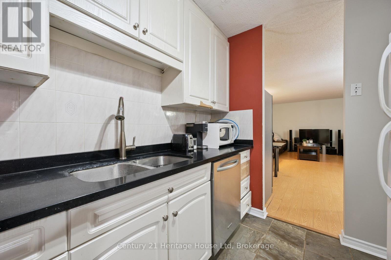 203 - 10 Ajax Street, Guelph, Ontario N1H 7N6 - Photo 7 - X12525804