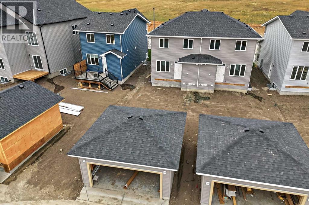 1921 Mccaskill Drive, Crossfield, Alberta  T0M 0S0 - Photo 5 - A2258179