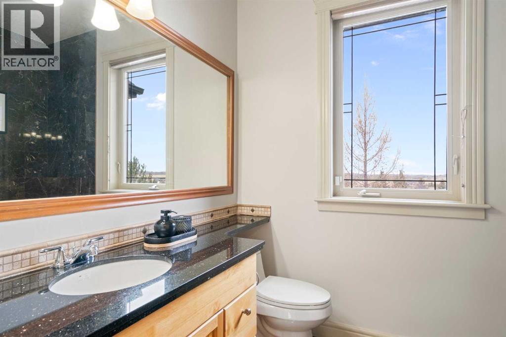 104 Grizzly Rise, Rural Rocky View County, Alberta  T4C 0B5 - Photo 13 - A2254075