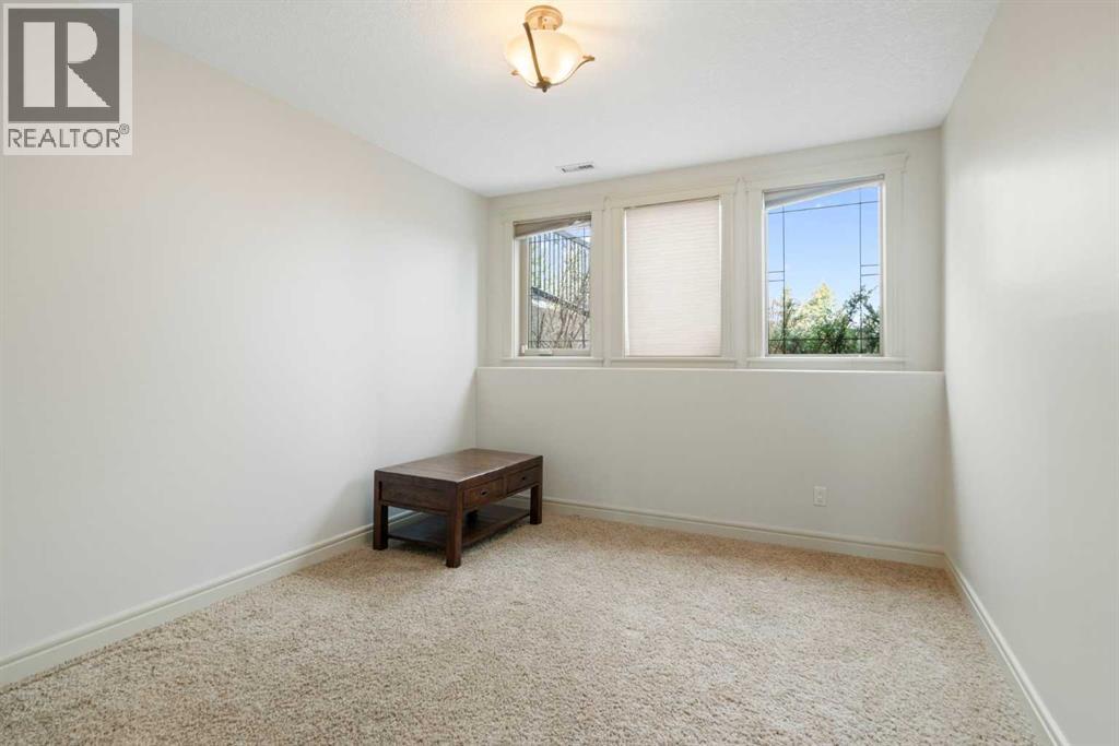 104 Grizzly Rise, Rural Rocky View County, Alberta  T4C 0B5 - Photo 35 - A2254075