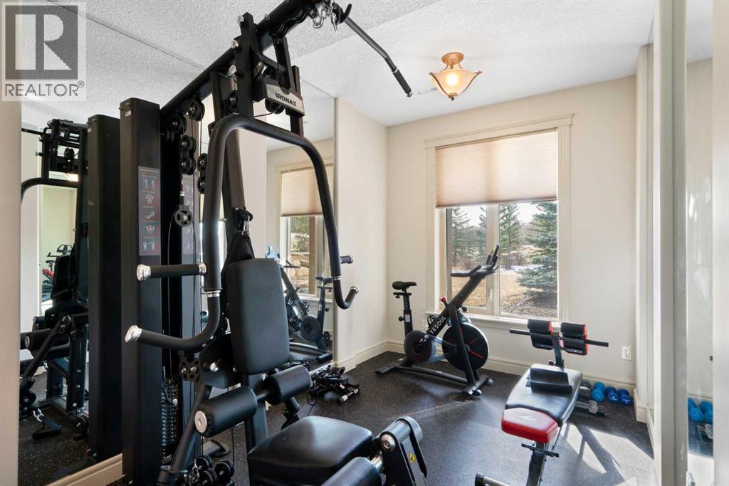 104 Grizzly Rise, Rural Rocky View County, Alberta  T4C 0B5 - Photo 34 - A2254075