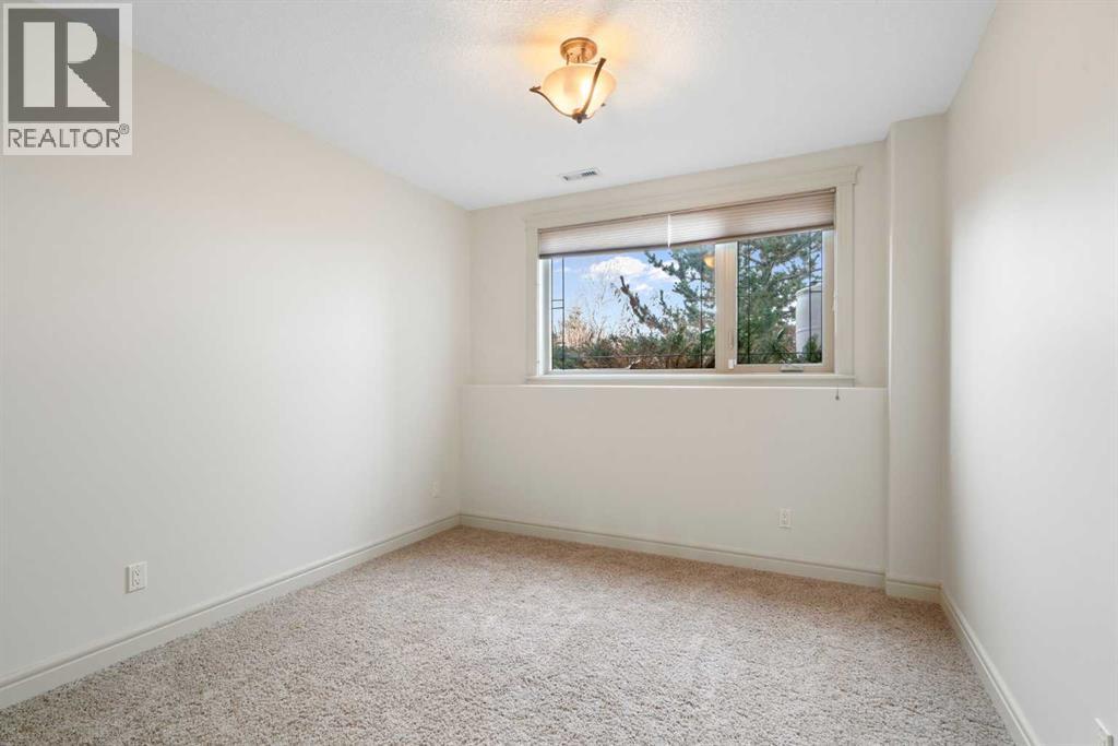 104 Grizzly Rise, Rural Rocky View County, Alberta  T4C 0B5 - Photo 32 - A2254075