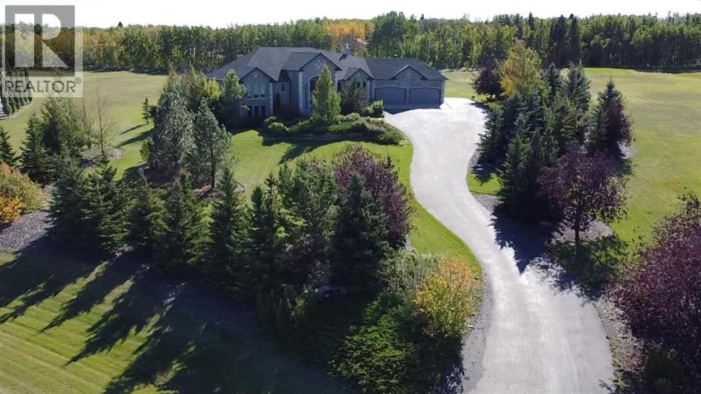 104 Grizzly Rise, Rural Rocky View County, Alberta  T4C 0B5 - Photo 1 - A2254075