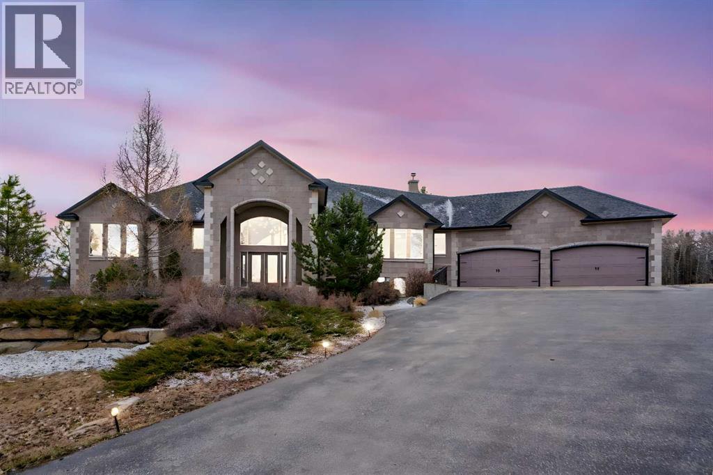 104 Grizzly Rise, Rural Rocky View County, Alberta  T4C 0B5 - Photo 2 - A2254075