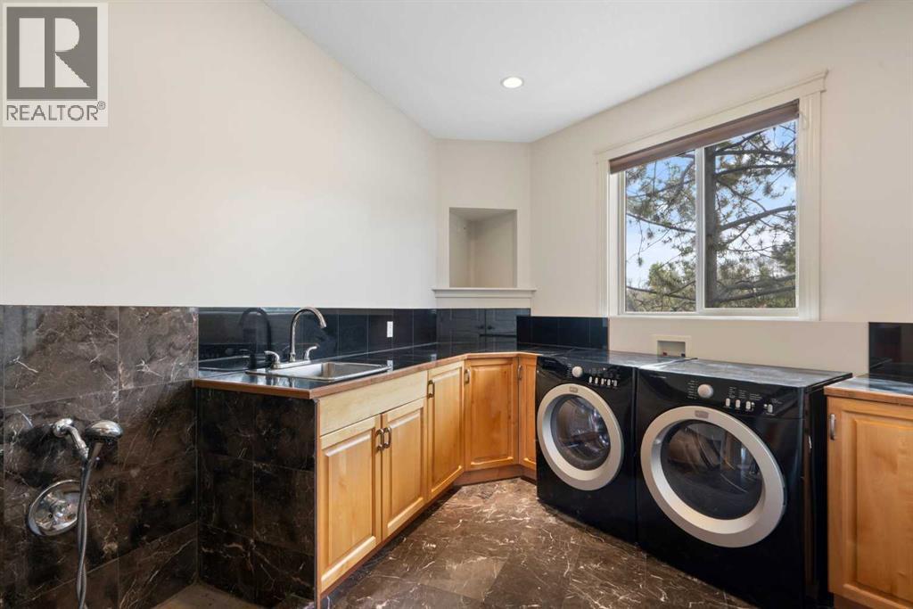 104 Grizzly Rise, Rural Rocky View County, Alberta  T4C 0B5 - Photo 23 - A2254075