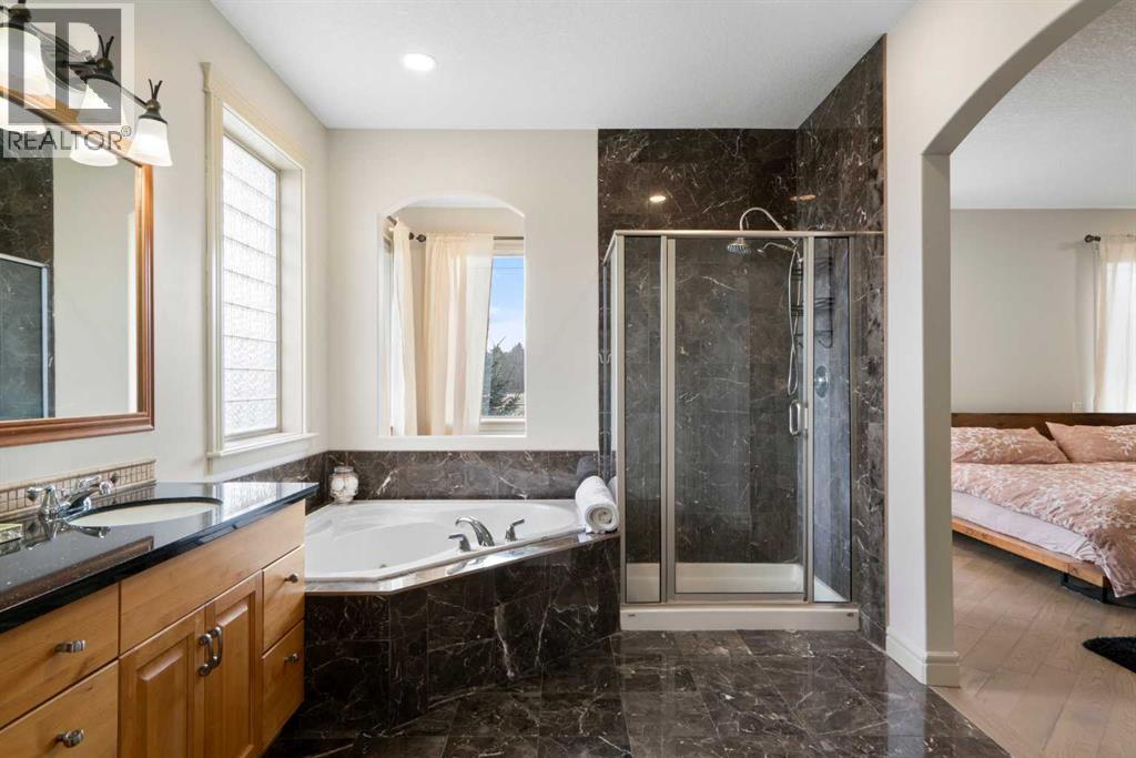 104 Grizzly Rise, Rural Rocky View County, Alberta  T4C 0B5 - Photo 18 - A2254075