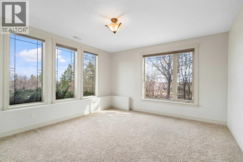 104 Grizzly Rise, Rural Rocky View County, Alberta  T4C 0B5 - Photo 31 - A2254075