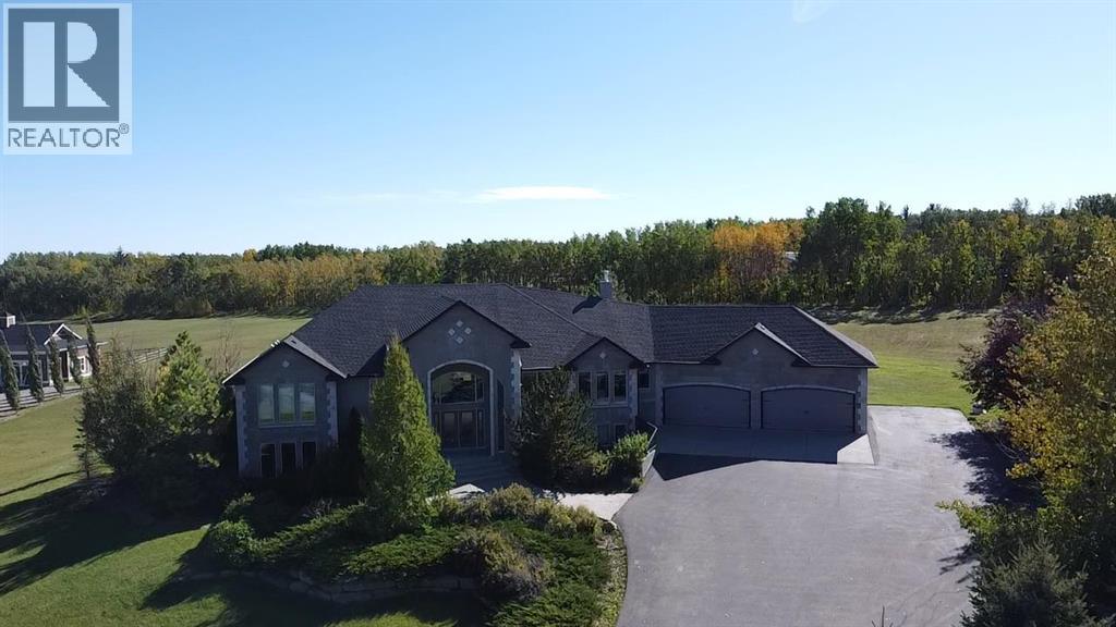 104 Grizzly Rise, Rural Rocky View County, Alberta  T4C 0B5 - Photo 3 - A2254075