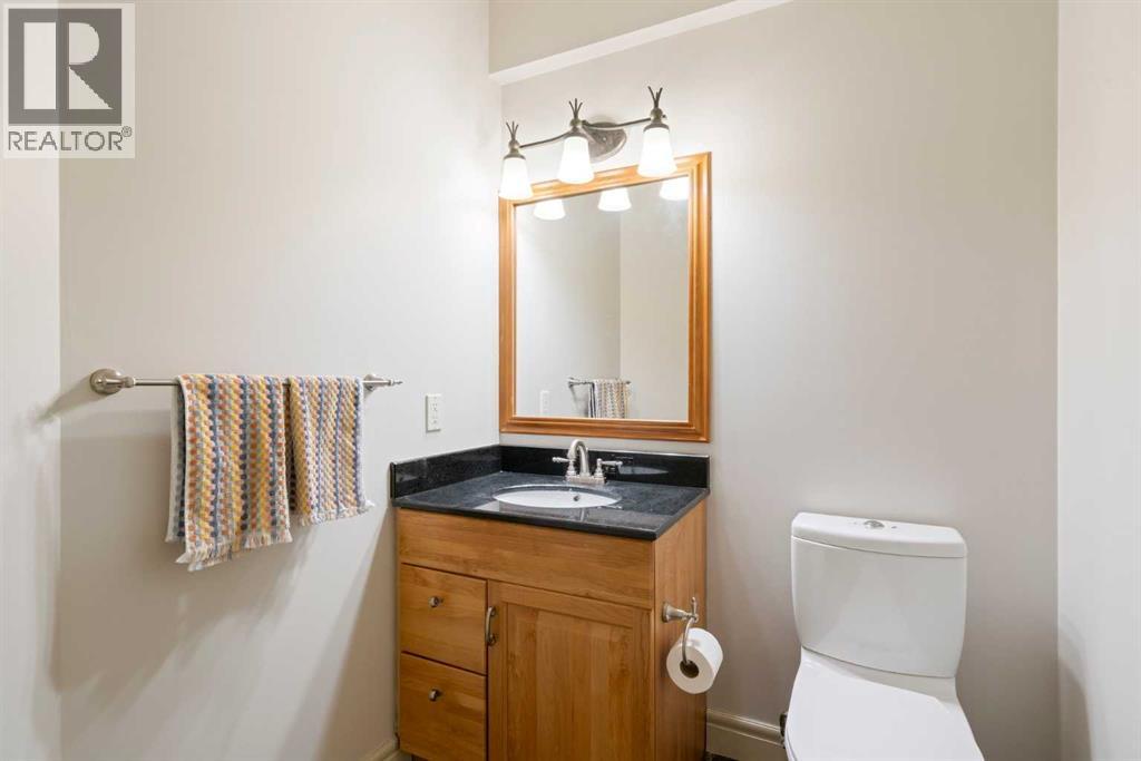 104 Grizzly Rise, Rural Rocky View County, Alberta  T4C 0B5 - Photo 40 - A2254075